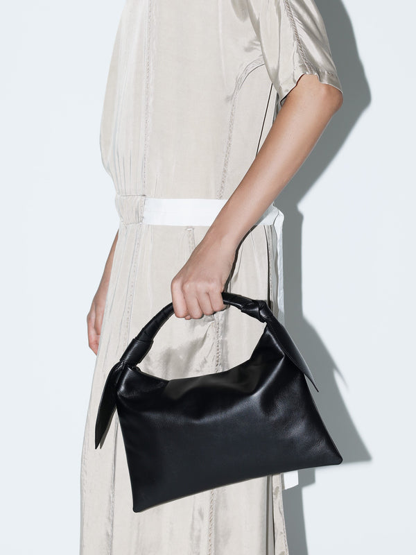 Leather ribbon bag