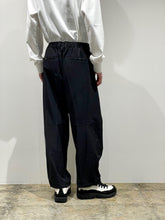 WATER REPELLENT STRETCH WIDE BAGGY PANTS