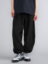 WATER REPELLENT STRETCH WIDE BAGGY PANTS
