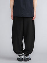 WATER REPELLENT STRETCH WIDE BAGGY PANTS