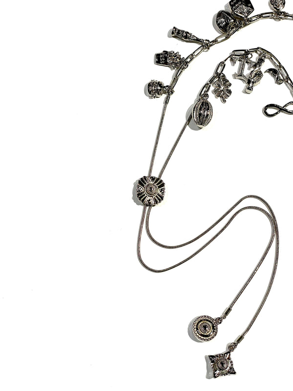 Metal motif loop tie